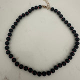 Black onyx on pink cord necklace